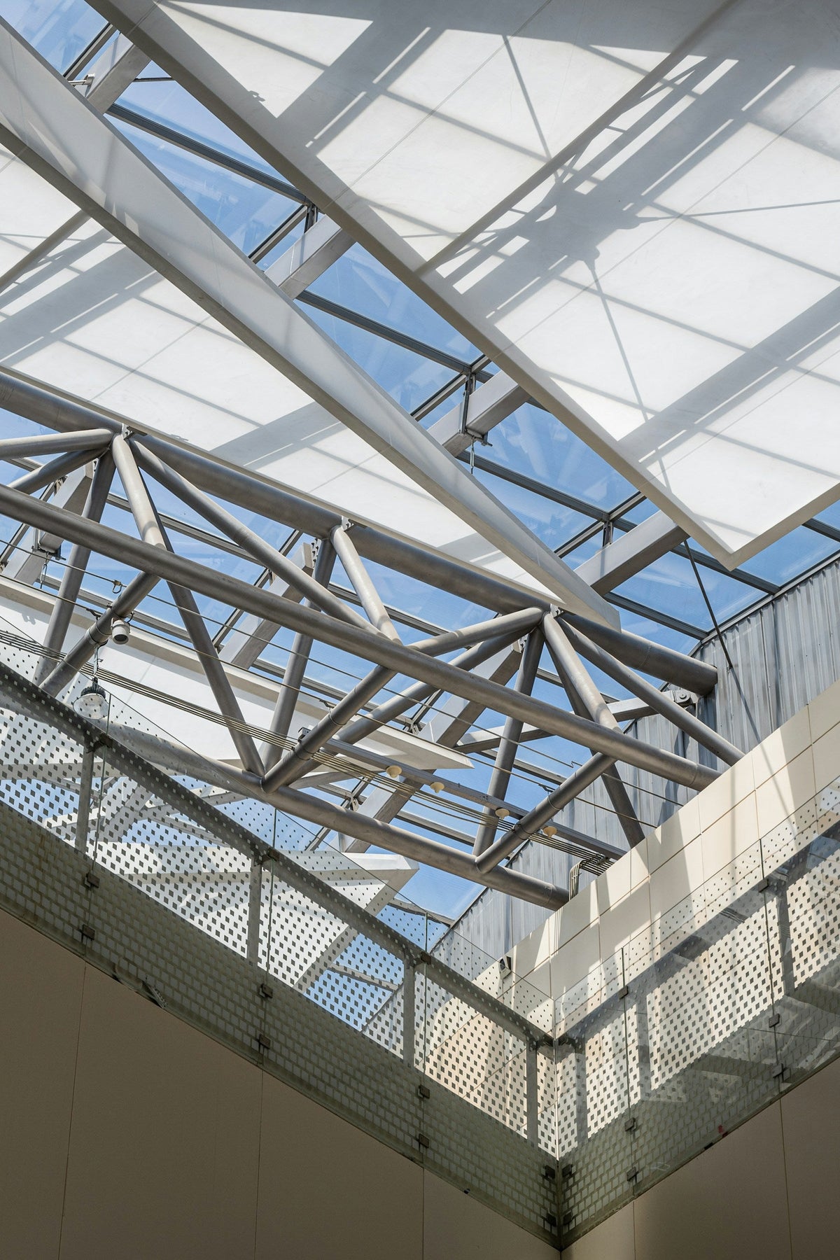 Glass panels and steel beams in an exhibition centre roof
