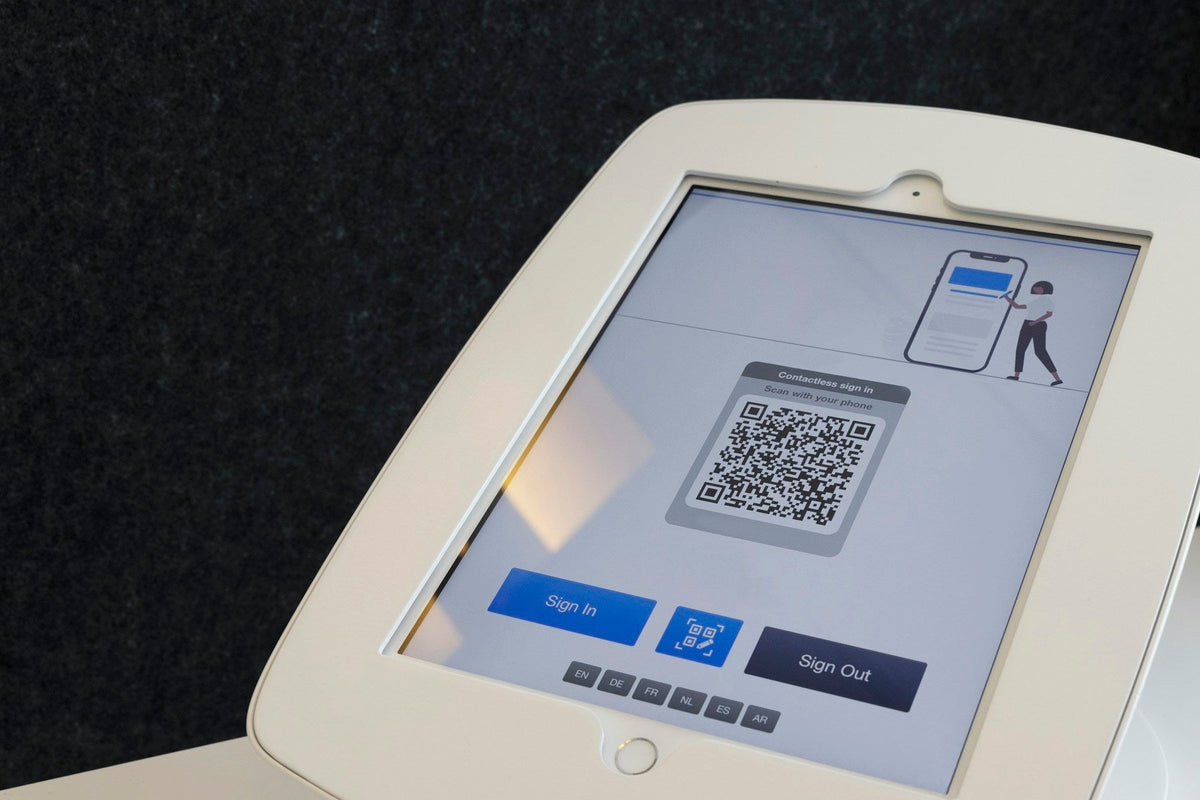 Tablet displaying a QR code for visitors