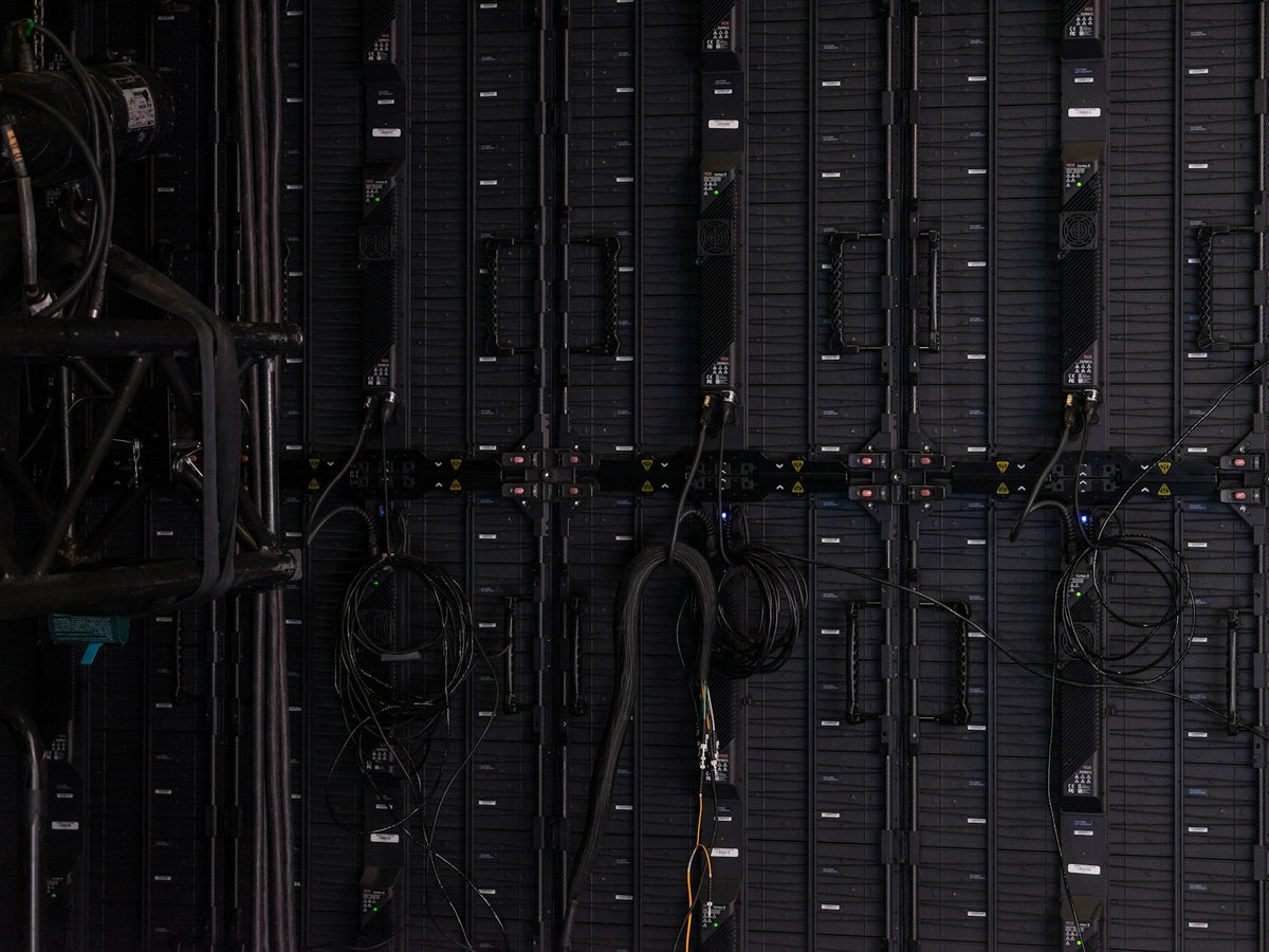 Cables connected behind modular LED display panels